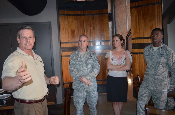 At a networking event in March, Al Lee (l), a capture manager for Abacus Technology, leads a discussion with attendees, including Young AFCEANs Master Sgt. Kelly Bales, USAF (2nd from l), Air Force Intelligence, Surveillance and Reconnaissance Agency (AFISRA); Emily Rausch, Young AFCEA adviser to the chapter board; and Capt. Sidney Harris, USAF, AFISRA.